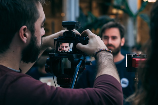 Cameraman filming onlocation corporate video